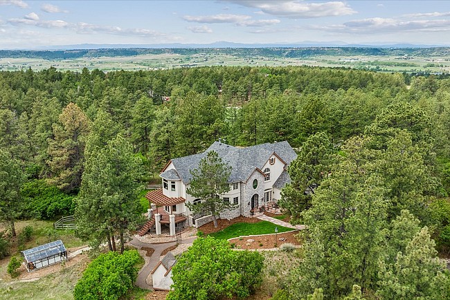 Extraordinary Custom Estate Nestled on 5.13 Private Acres in Kelty Farms in Franktown!
